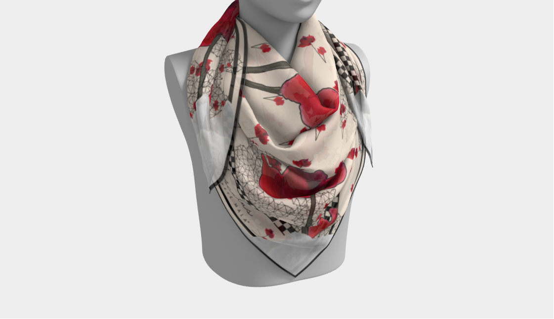 Scarf with a red and black pattern draped over a mannequin on a light gray background